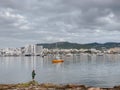 Beautiful seascape with parked boats and buildings in Sant Antoni de Portmany