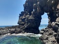 Beautiful seascape, Rock arch, nature landmark of Mauritius far away from white sand beaches.
