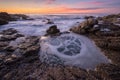 A beautiful seascape with rocks and water in the foreground Royalty Free Stock Photo