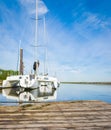 Beautiful seascape and sailing catamaran in the blue sky at the background. Sailing on Trimaran Sail Boat