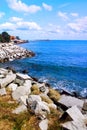 Beautiful seascape - sea, blue sky and coast rocks Royalty Free Stock Photo