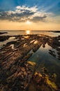 Beautiful seascape. Sea and rock at the sunset. Nature compositi