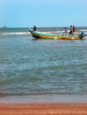 A seascape of the shrine velankanni beach with tour people.