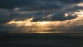 Beautiful seascape splitting rays cloudy clouds sun light