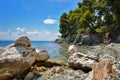 Beautiful seascape with stones and translucent blue water