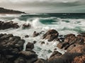 Beautiful seascape with stormy waves breaking on the rocky shore. Toned. Royalty Free Stock Photo