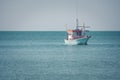 Beautiful seascape view of fishing boat floating on the sea. Royalty Free Stock Photo