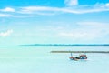 Beautiful seascape view nature with fishing boat and clear water sea blue sky clouds background in tropical ocean sea Royalty Free Stock Photo