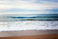 Beautiful seascape, wave rolling on a sandy beach, tropics, vacation, travel background