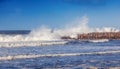 Beautiful seascape, waves are breaking about the breakwater, storm, the power of the ocean