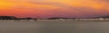 Beautiful seaside cityscape in the evening with a beautiful orange sky at sunset. Llandudno, Wales, United Kingdom