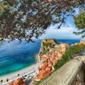 Beautiful seaside town village Scilla with old medieval castle on rock Castello Ruffo Royalty Free Stock Photo