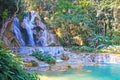 Beautiful secluded idyllic lonely wild jungle forest landscape lagoon, waterfall rock cascade, turquoise natural plunge pool -