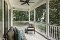 Beautiful second story porch with furniture and view of trees