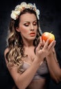 Beautiful seductive woman with apple