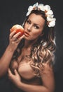 Beautiful seductive woman with apple Royalty Free Stock Photo