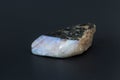 Beautiful semi-precious stone nacre on a black background Royalty Free Stock Photo