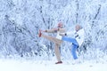 Senior couple doing exercises in winter forest Royalty Free Stock Photo