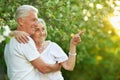 Beautiful senior couple hugging in the park Royalty Free Stock Photo