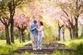 Beautiful senior couple in love outside in spring nature. Royalty Free Stock Photo