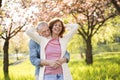 Beautiful senior couple in love outside in spring nature. Royalty Free Stock Photo