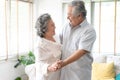 Beautiful senior couple smiling in love dancing at home.Happy li Royalty Free Stock Photo