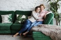 Beautiful senior mom and her adult daughter are hugging, looking at camera and smiling. Royalty Free Stock Photo