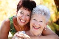 Beautiful senior mother and daughter smiling