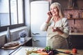 Old woman in the kitchen Royalty Free Stock Photo