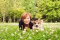 Beautiful senior woman with dog in spring nature Royalty Free Stock Photo