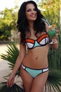 Beautiful sensual woman with dark hair in luxurious swimsuit Royalty Free Stock Photo