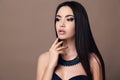 Beautiful sensual woman with dark straight hair with bright makeup Royalty Free Stock Photo