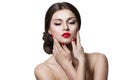 Beautiful sensual woman touching her face. Beauty and skincare concept. Isolated over white.