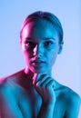 Beautiful sensual woman touching her face  on light background. Beauty and skincare concept. Spa Royalty Free Stock Photo