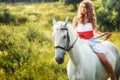 Beautiful sensual women riding on white horse Royalty Free Stock Photo