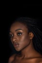beautiful sensual young african american woman with water drops on face looking away Royalty Free Stock Photo