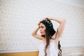 Beautiful sensual young bride in bedroom. Last preparations for the wedding. Bride waits for her groom. Wedding morning Royalty Free Stock Photo