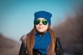 Tanya. Woman face blue hat, sunglasses