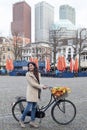 Beautiful sensuality elegance lady walking beside her bicycle