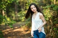 A beautiful serious teen brunette girl looking away from the camera Royalty Free Stock Photo