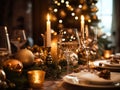 Beautiful served table with decorations and candles. Christmas dinner setting in a cozy dining room. Winter holidays and Royalty Free Stock Photo