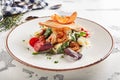 Beautiful serving white restaurant plate of caesar salad Royalty Free Stock Photo