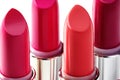 Beautiful set of lipsticks in red colors. Beauty cosmetic collection. Fashion trends in cosmetics with bright lips