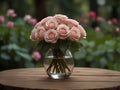 A beautiful set of pink roses arranged as a bouquet in a transparent vase. Royalty Free Stock Photo