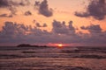 Beautiful setting sun over the ocean on the Hikkaduwa turtle beach, Sri Lanka Royalty Free Stock Photo