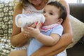 Beautiful Baby Girl Feeding Royalty Free Stock Photo