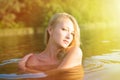 Beautiful sexi young lady relaxing in water Royalty Free Stock Photo