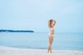 Beautiful, blond with hot legs posing on the beach Royalty Free Stock Photo