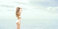 Beautiful, blond posing on the beach. Royalty Free Stock Photo