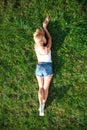 Beautiful blonde woman in blue jeans shorts Royalty Free Stock Photo
